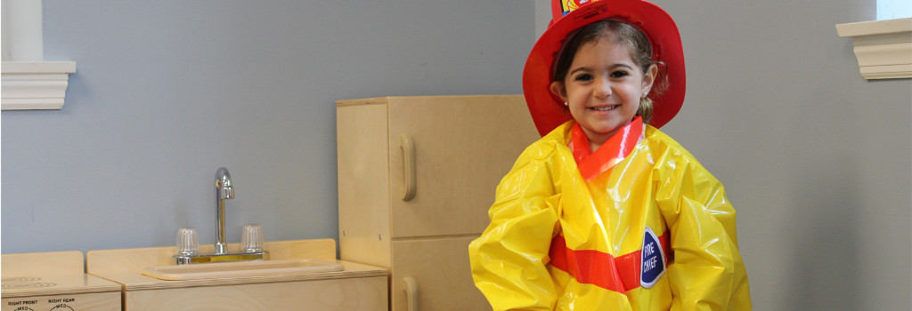 A young student at Forge Early Learning Center dressed as a firefighter